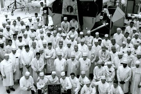 Grumman workers pose with one of their lunar modules (LM-12) at the company's plant in Bethpage, New York, May 1971.