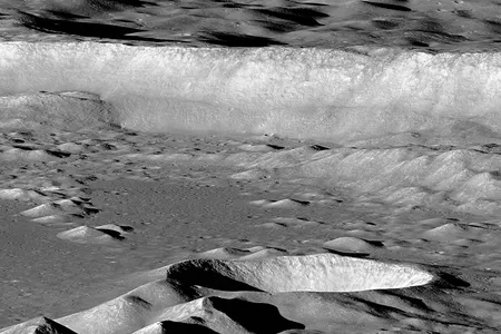 A Lunar Reconnaissance Orbiter view of the far side crater Antoniadi, an example of some of the spectacular vistas that await future inhabitants of the Moon. 