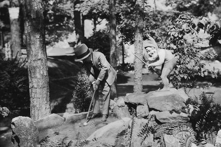 An unidentified player takes a putt at the original "Tom Thumb Golf" built by Garnet Carter.