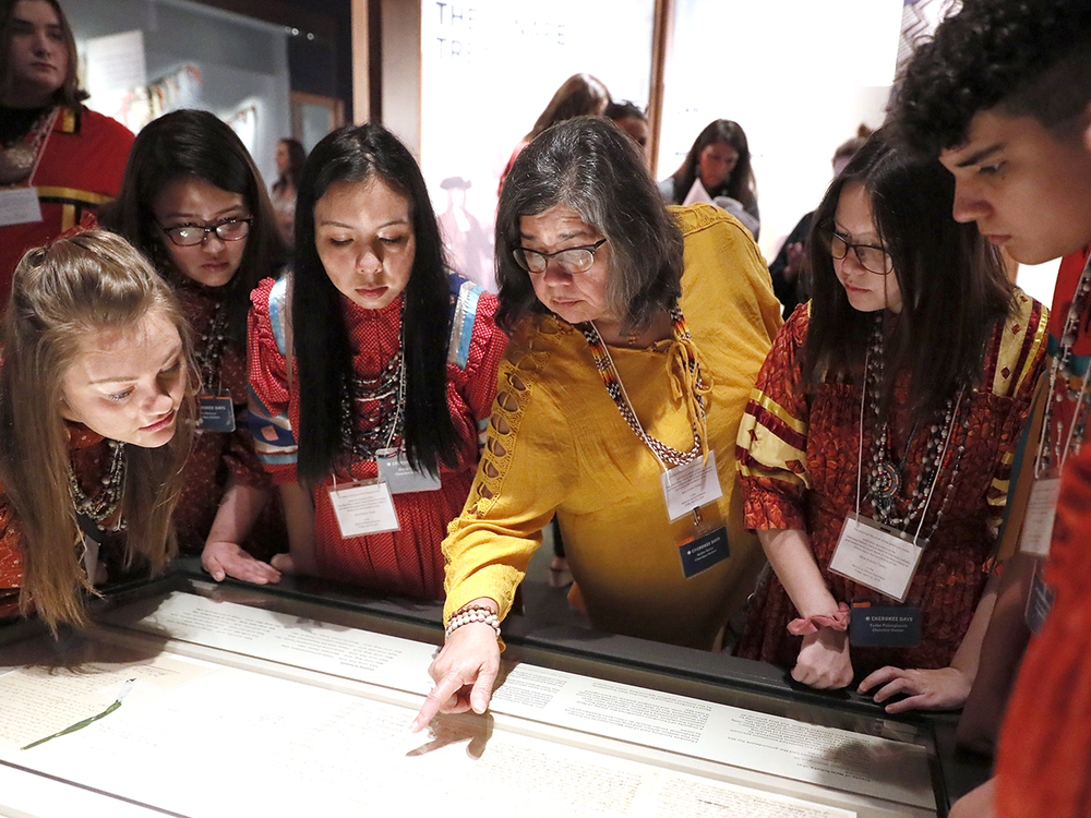 Members of the Cherokee Youth National Choir taking part in the installation of the Treaty of New Echota at the National Museum of the American Indian in Washington, D.C. (Paul Morigi/AP Images for the Smithsonian)