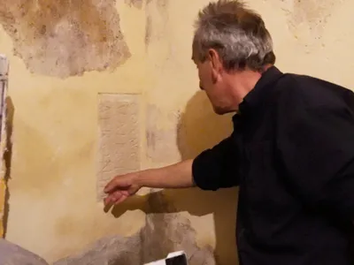 An Artist Noticed a Leak in His Studio. The Repairs Revealed a Mysterious Ancient Engraving Hidden Inside the Walls image