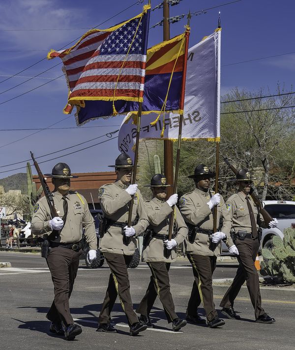 border patrol marches with US flag thumbnail