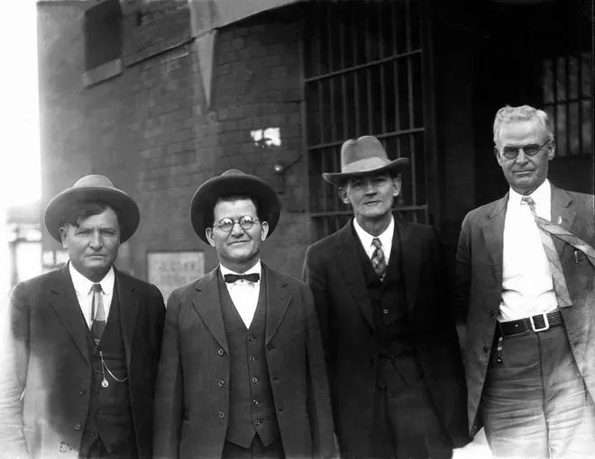 William Hale (second from left) and John Ramsey (third from left), flanked by two U.S. marshals