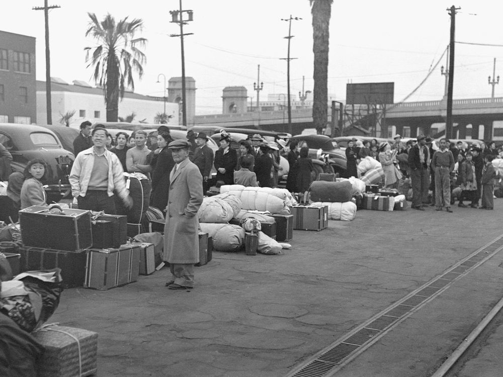 Japanese Americans Waiting in Los Angeles for train to Manzanar