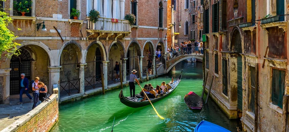  Gondola ride through the canals of Venice 