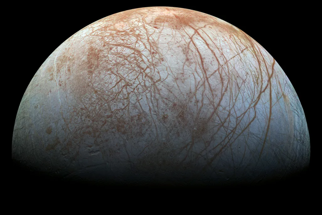 the exterior of europa, with dark orange streaks