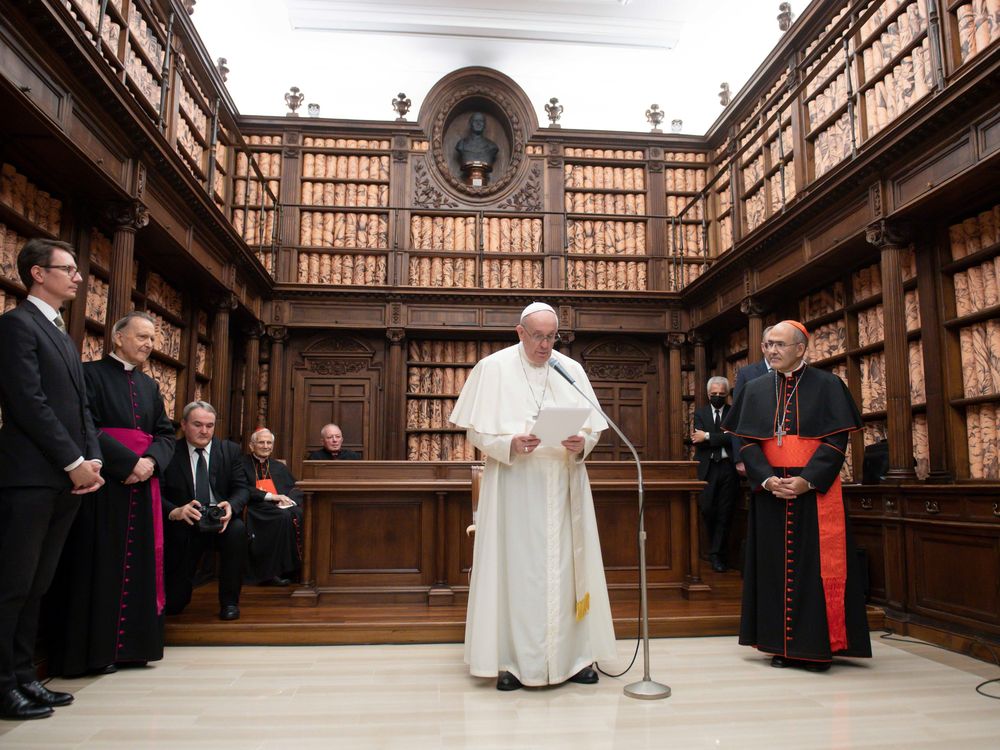 Pope Francis speaks at the installation's opening