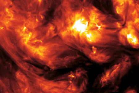 This image of the Sun's outermost layer, or corona, was taken June 10, 1998, by TRACE (Transition Region and Coronal Explorer). The Earth-orbiting NASA spacecraft, launched two months earlier, has an unobstructed view of the Sun eight months of the year. It is helping to solve the mystery of why the Sun's corona is so much hotter (3.6 million degrees Farenheit) than its surface (11,000 degrees Farenheit). TRACE is also shedding light on solar storms, which damage satellites and disrupt power transmissions.