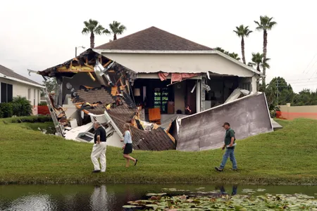 A sinkhole from 2012 that swallowed the back of a home at Shoal Drive in Hudson. At the time the picture was taken, Pasco County Fire officials said the sinkhole is currently 40 feet wide and 20 feet deep.