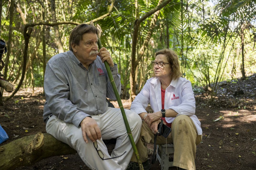 Arlen and Diane Chase have been working in Caracol for the last 40 years. Above, the couple rests at an excavation site.