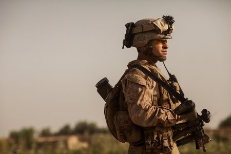 Col. Manuel Jimenez stands on patrol in Afghanistan