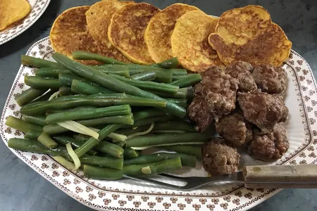 Eighmey's colonial-style corn cakes (top), forcemeat balls (lower right) and pickled French beans (lower left).