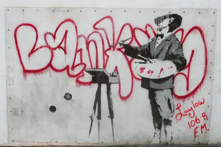 The secretive street artist Banksy painted this graffiti mural in London in 2008.