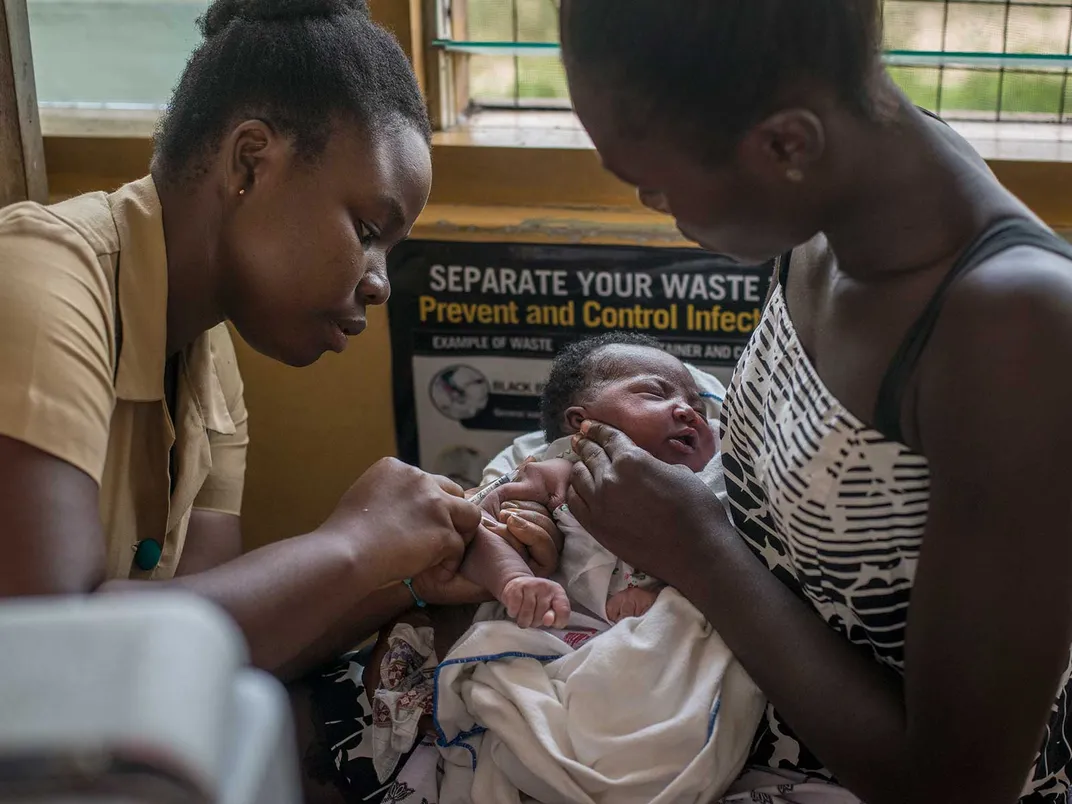 Malaria Vaccine Being Administered