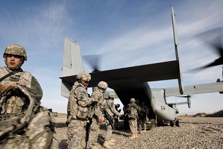 The Osprey’s role in Afghanistan has been mainly assault support: transporting troops and supplies (here, Army soldiers unload gear from an MV-22 at a remote combat outpost).
