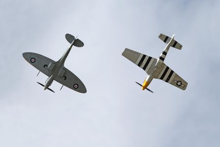 Two of the best-performing World War II fighters, a Supermarine Spitfire (left) and a North American P-51 (flying together on July 17, 2011) had wings and horizontal stabilizers of vastly different shape.