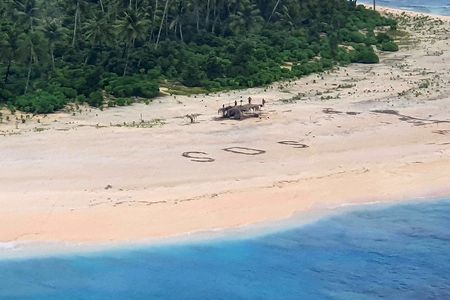 An Australian ARH Tiger attack helicopter was able to land on the beach and deliver supplies to three castaways on tiny Pikelot Island. Their S.O.S. message was spotted by the U.S. crew of a KC-135 Stratotanker.
