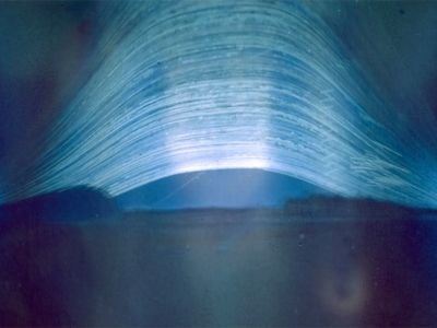 Regina Valkenborgh's photograph features 2,953 arcs of light streaking across the sky, recording the sun’s rising and setting over eight years.