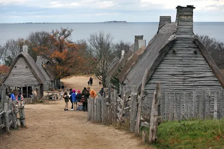 Plimoth Plantation is a living history museum that features a recreation of Plymouth's 17th-century English village and a Wampanoag homesite.