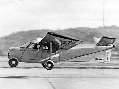 A Taylor-designed Aerocar takes off, probably at or near Longview, Washington, circa 1949.