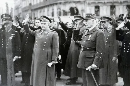 Spanish dictator Francisco Franco (left) and Philippe Petain (right), head of state for Vichy France, salute during the French national anthem during a meeting in Montpelier, France, March, 1941.