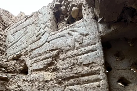 The mural is decorated with blue and yellow pigments.