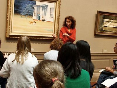 Teaching artist Mary Hall Surface stands in front of Edward Hopper’s 1939 painting Cape Cod Evening at the National Gallery of Art. Surface will lead a creative writing workshop for Smithsonian Associates at the Freer Gallery of Art on March 27.