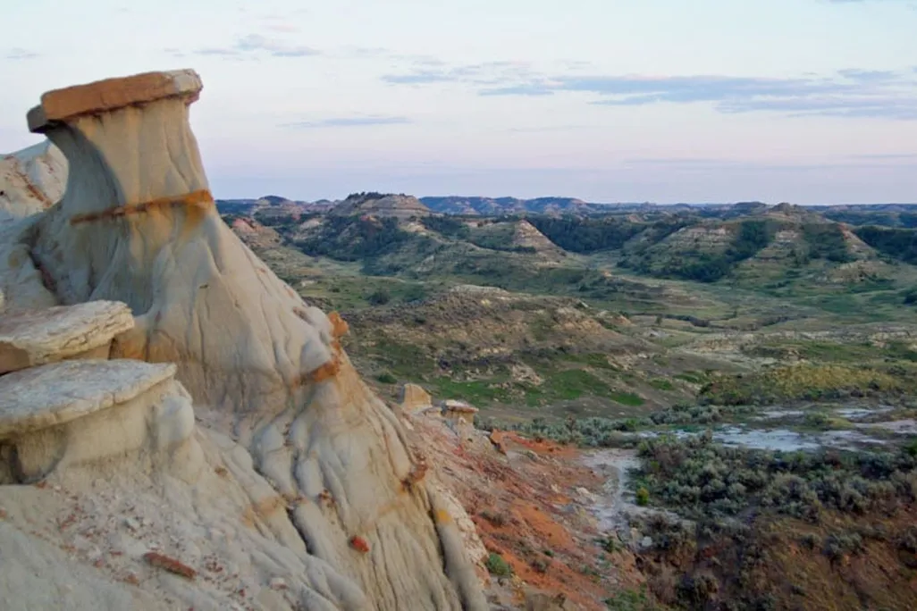 Rock formation with valley beyond
