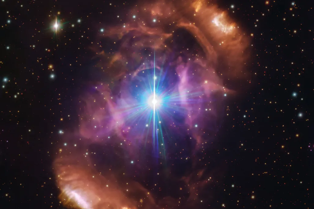 A close-up of the Dragon's Egg Nebula, with two "mismatched" stars inside.
