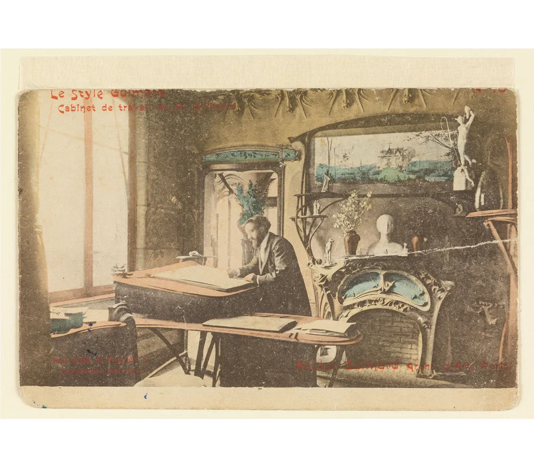 Postcard no. 10 of the Le Style Guimard series, “Hector Guimard in his workshop at Castel Béranger”, 1903
