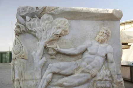 A marble sarcophagus depicting a drinking contest between Hercules and Dionysus