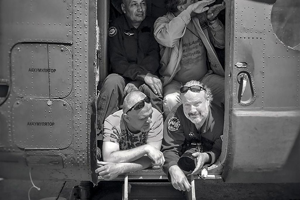 Bill Ingalls and others in helicopter