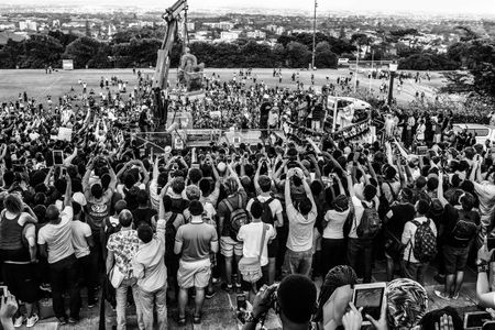 The dethroning of Cecil John Rhodes, after the throwing of human faeces on the statue and the agreement of the University to the demands of students for its removal. The University of Cape Town, 9 April 2015