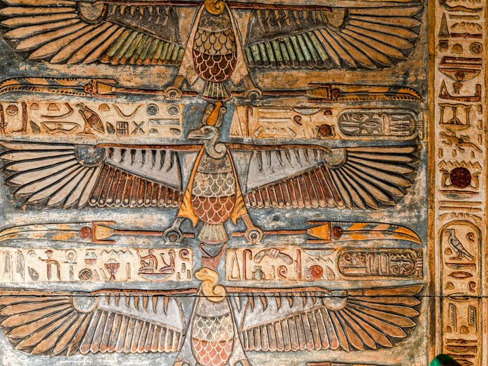 The restored ceiling of an Egyptian temple shows vulture-like depiction of goddesses