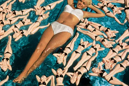 Alan Grant photographed Jayne Mansfield in 1957 in her Hollywood swimming pool, among hot-water bottles in her image, which now fetch hundreds of dollars each on Internet auction sites. "I could have been a multimillionare [if I'd saved some]," jokes Grant.