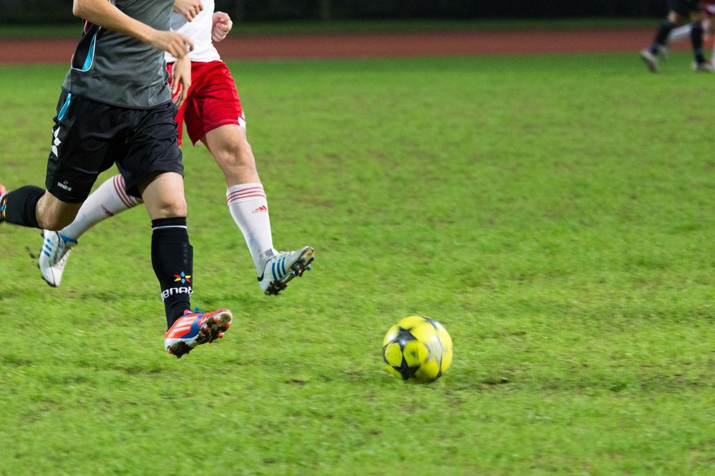 Men Playing Soccer