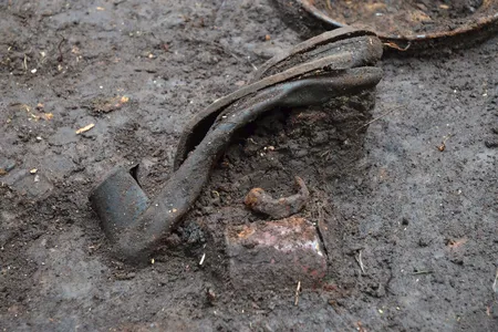 Woman's shoe found at the site of the March 1945 massacre