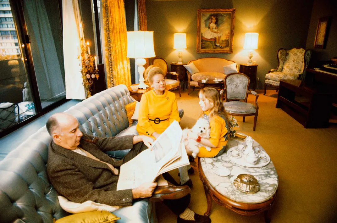 Mitchell at home with husband and daughter,