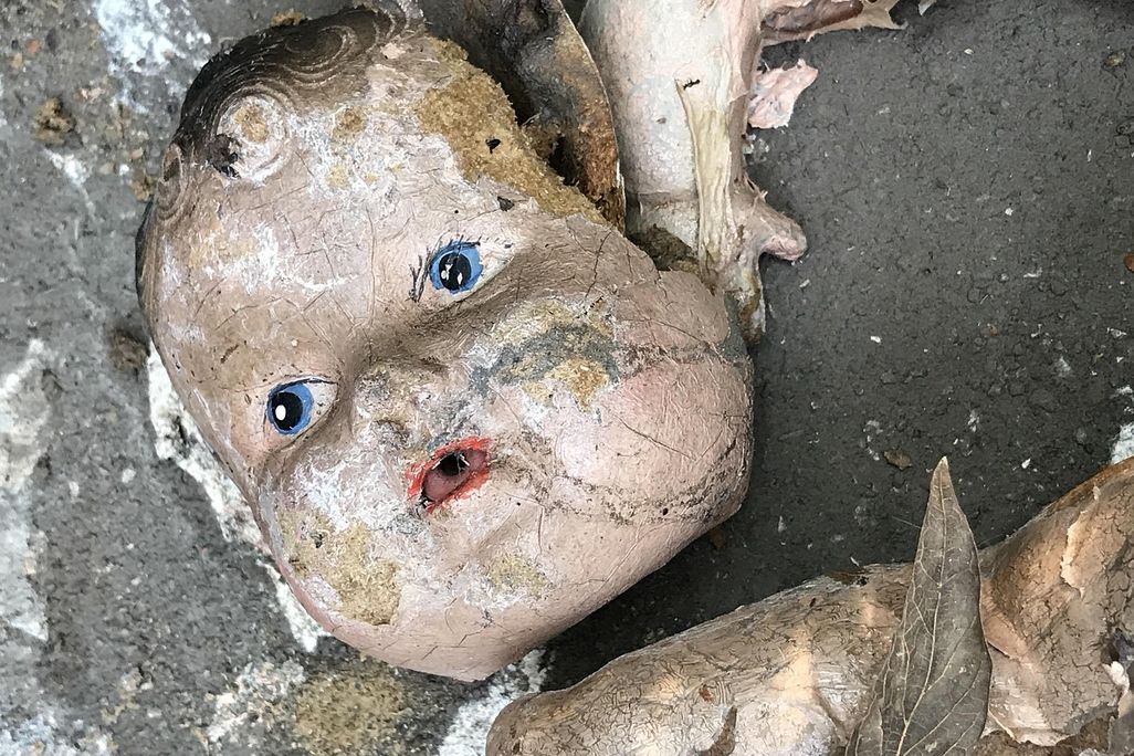 Creepy doll head