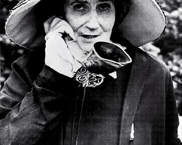 Madame de Meuron, a Swiss eccentric, with her characteristic ear trumpet and hat