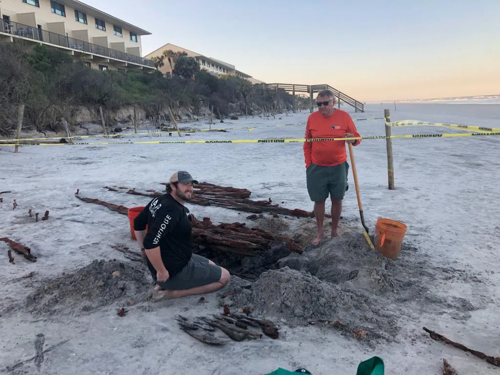 Skeletal shipwreck revealed by beach erosion on US island