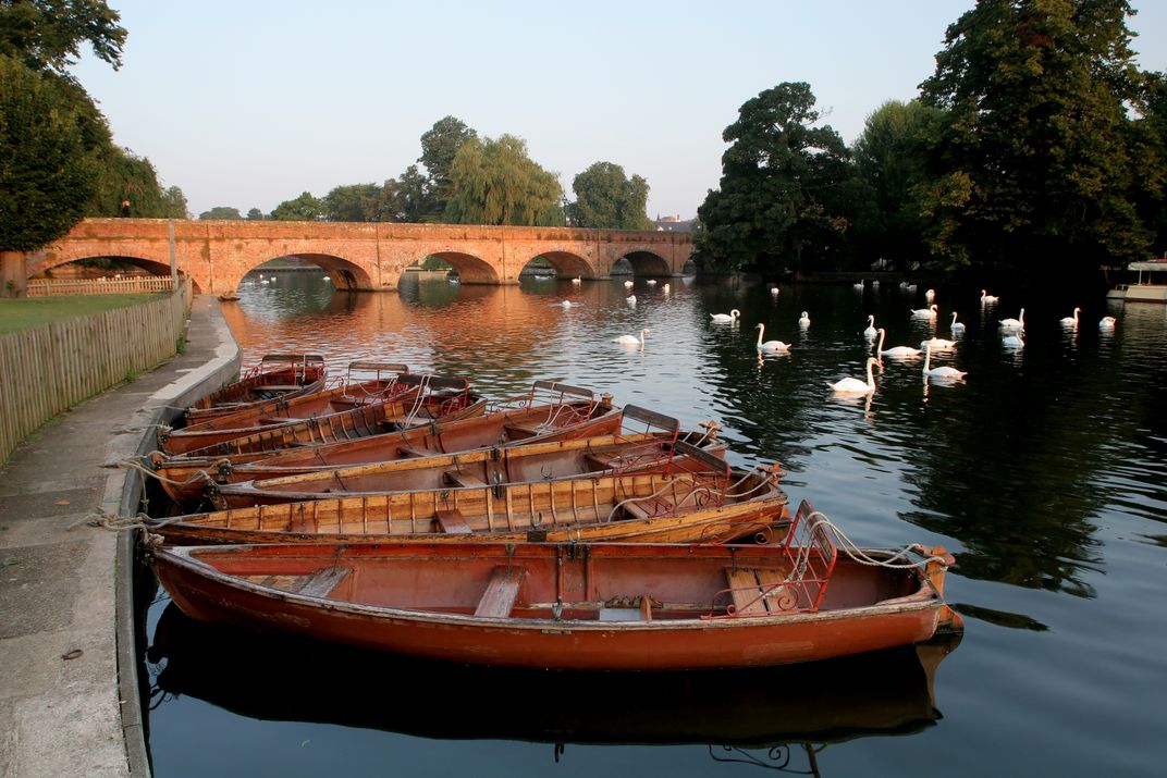 Boats and swans on the River Avon