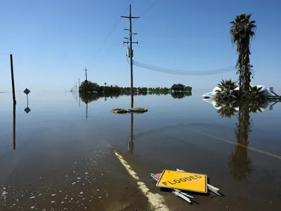 Floodwaters cover a street in the reemerging Tulare Lake, in California&rsquo;s Central Valley, on April 14, 2023 in Corcoran, California.