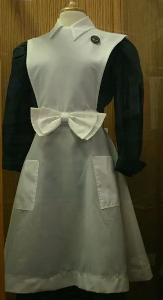 The classic Harvey Girl uniform.