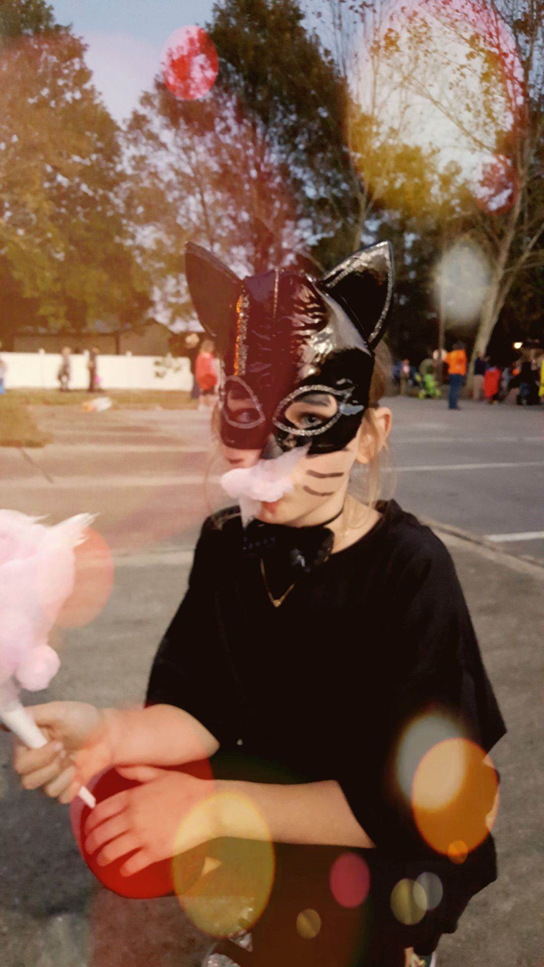 Girl dressed as Cat eating Cotton Candy Smithsonian Photo Contest