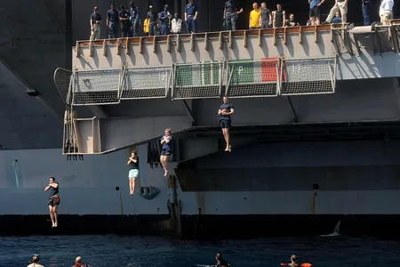 During Operation Enduring Freedom, these sailors aboard USS Dwight D. Eisenhower took time from maritime security operations to drop into the north Arabian Sea.