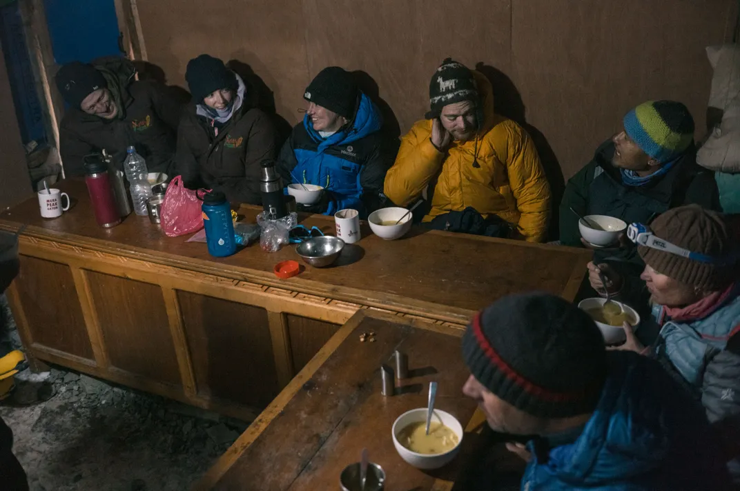 Trekkers gather inside the teahouse