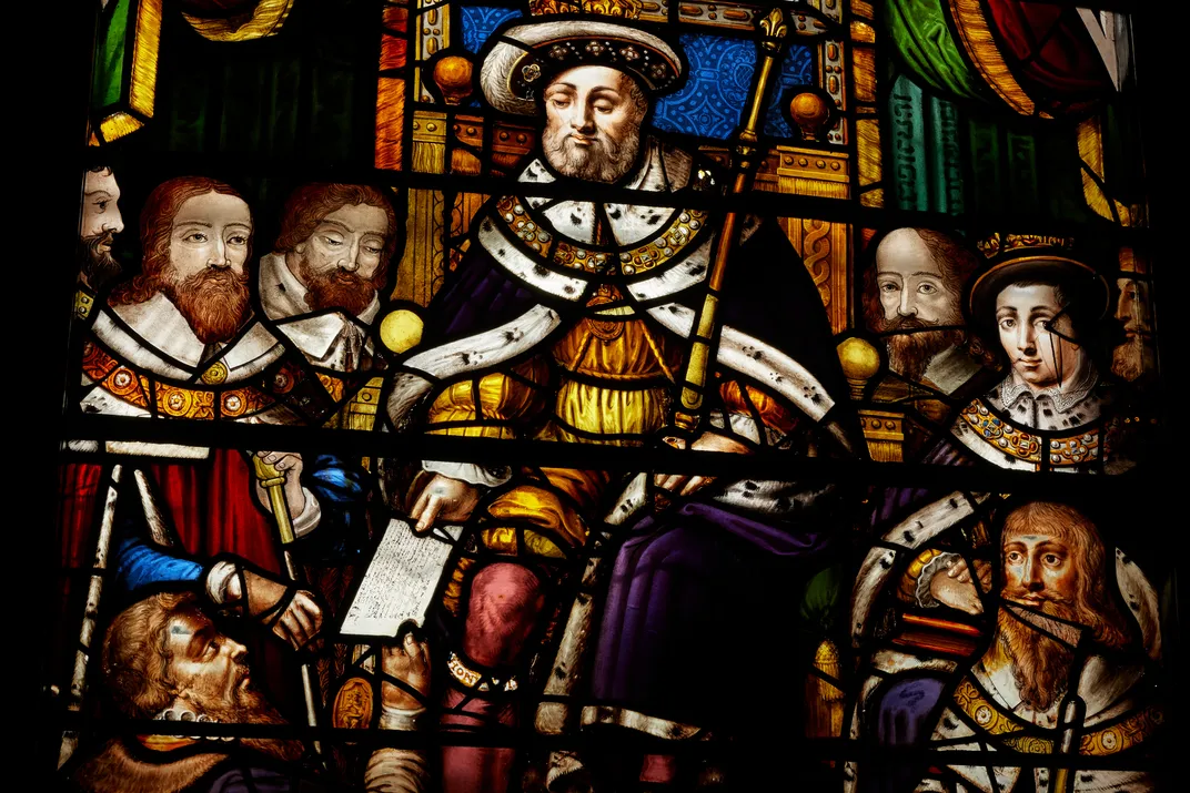 A stained-glass window featuring Henry VIII at St. Bartholomew's Hospital