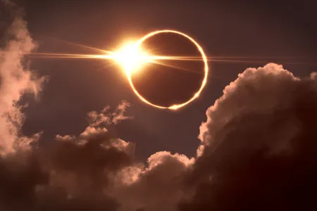 Astronomy_Total solar eclipse with clouds_DT_122398998.jpg