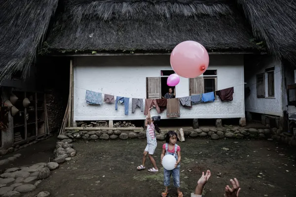 Childhood Joy: Balloons in the Village thumbnail